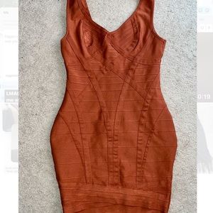 Brand New never worn burnt orange bandage dress